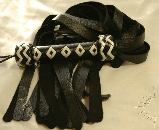Garment Flogger with Black and White Handle