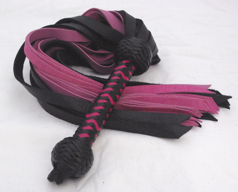 Black Bull with Pink Garment Flogger - Click Image to Close